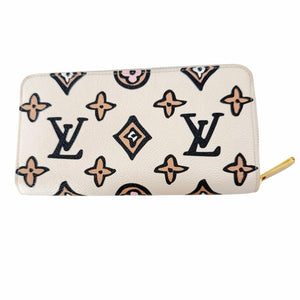 Louis Vuitton Monogram Giant Wild At Heart Zippy Wallet in the Creme colorway