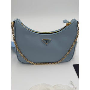 Prada Re-Edition curved shoulder bag in light cornflower blue