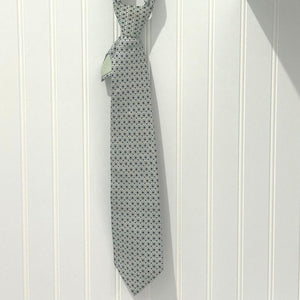 Hermes silk tie featuring a refined grey micro-pattern