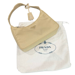 Prada Re-Edition 2000 Re-Nylon Mini Bag in a neutral beige/desert sand shade