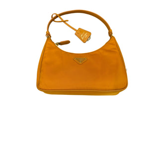 Prada Re-Edition 2000 Re-Nylon Mini Bag in a orange/pumpkin shade