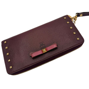 MCM Studded Bow Zip-Around Continental Wallet